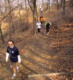 Runners in wooded area